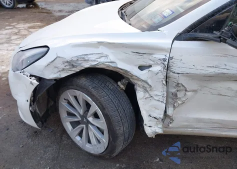 2021 Tesla Model 3 Standard Range Plus Rear-Wheel Drive from USA, damaged, VIN 5YJ3E1EA2MF087803